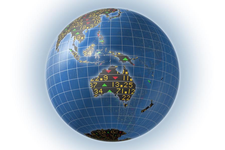 a globe focused on Australia with stock information over top