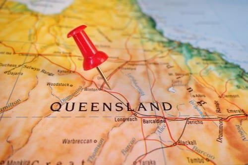 map of queensland with a push pin in it