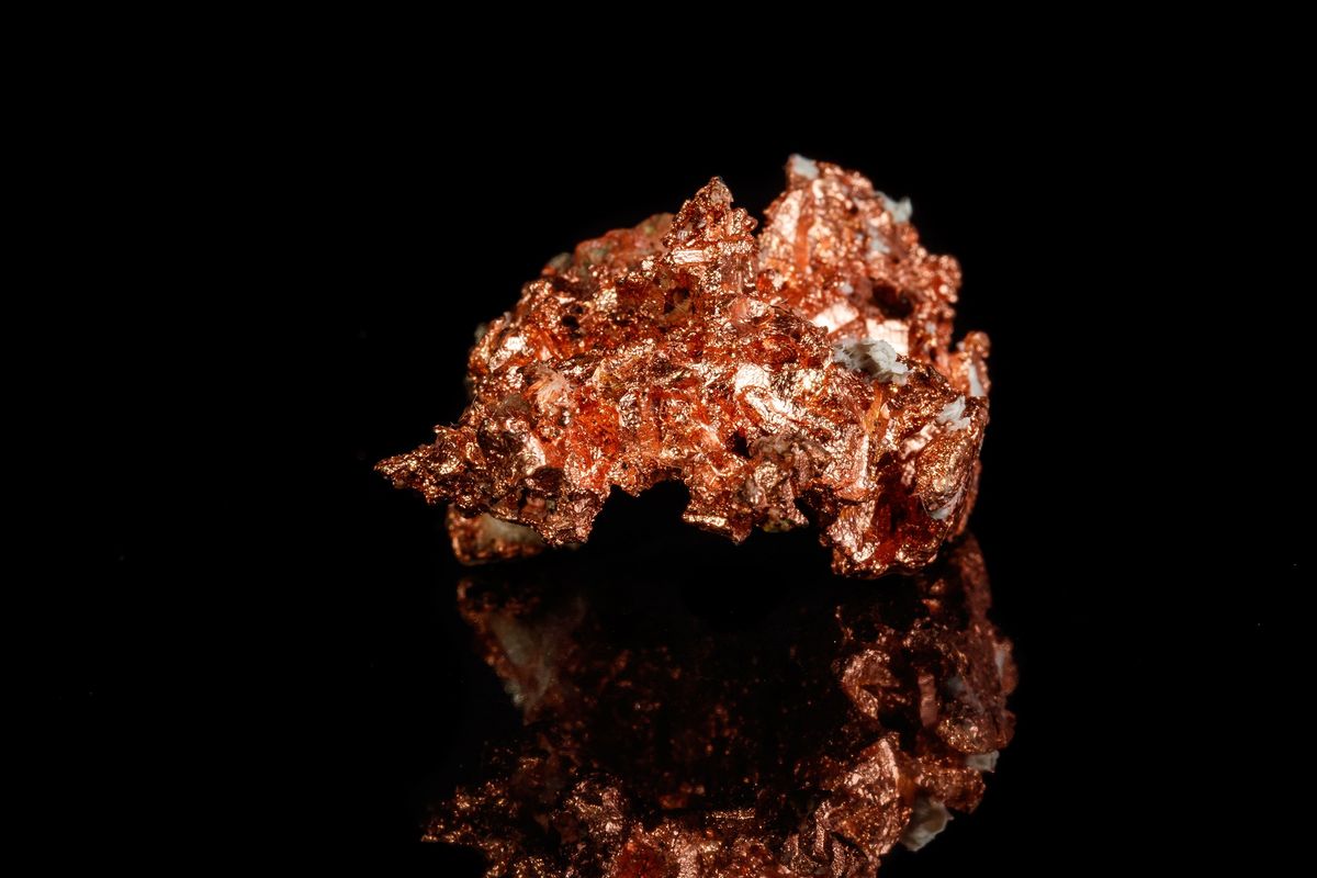 piece of copper on black background
