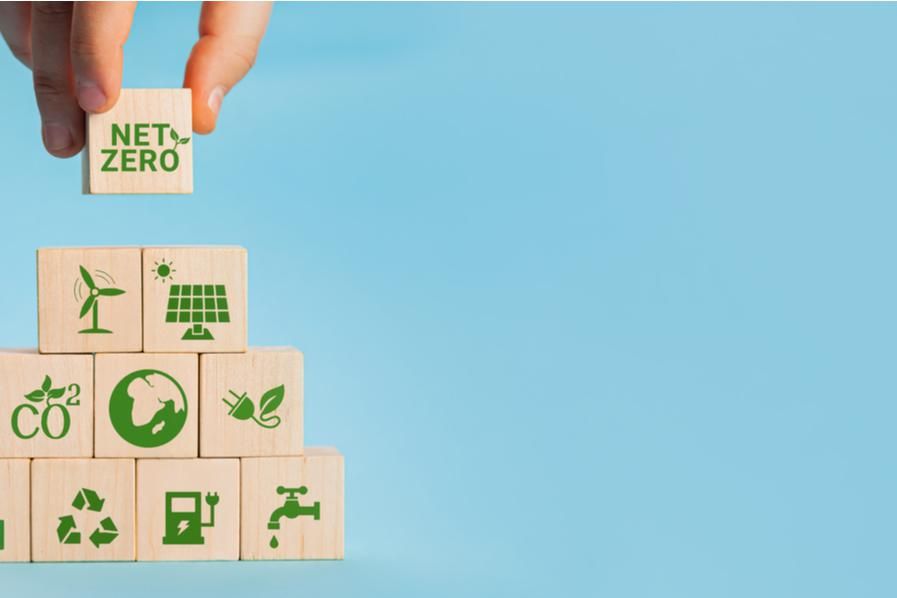 wooden blocks showing sustainability-related images